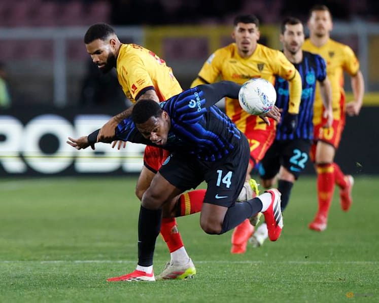 Late goals keep Inter in control of Serie title race