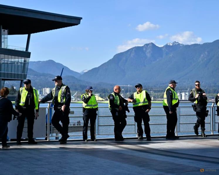 Advocates for homeless, hotel workers rally outside FIFA Congress in Vancouver