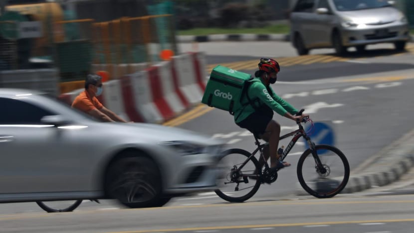Cabbies, delivery workers among those who can claim S$250 NTUC FairPrice vouchers if they get hurt on the job in new scheme