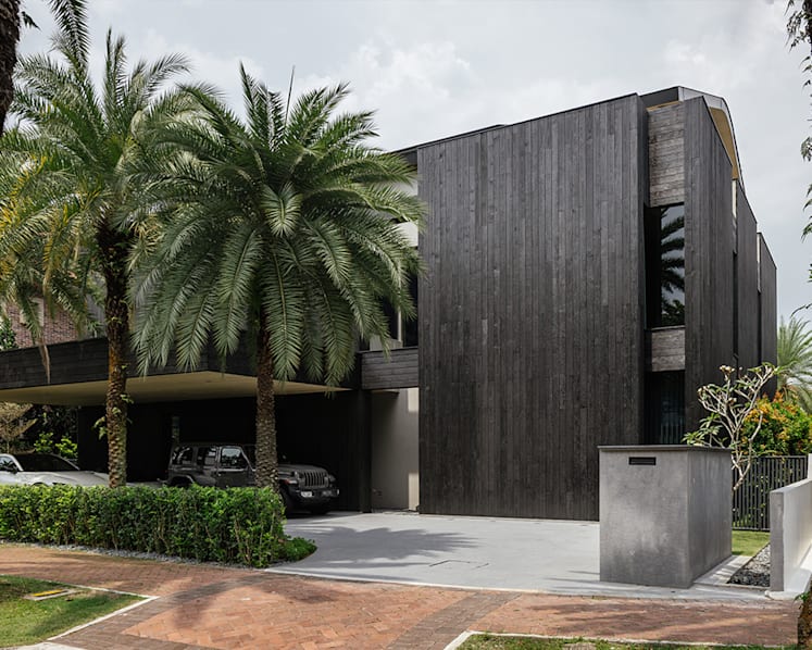 Why this Sentosa Cove house was wrapped in charred black timber