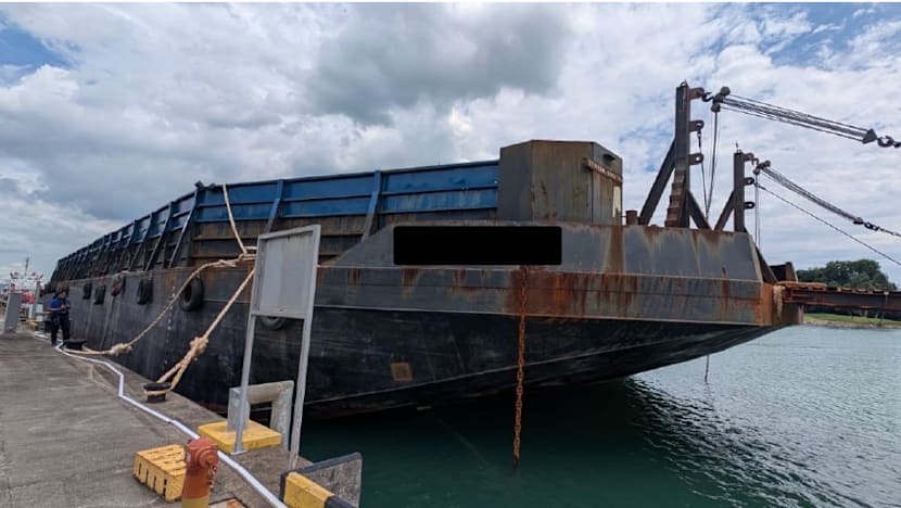 Indonesian man charged with helping 3 people hidden on barge enter Singapore illegally