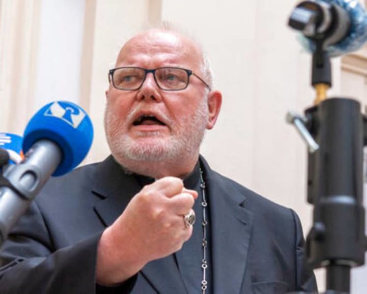 Pope rejects German cardinal's resignation, urges reform