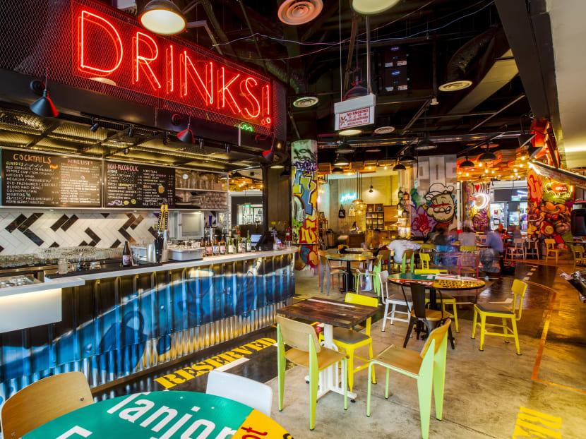 Neon lights and colourful graffiti-walls  inside the new Pasarbella@Suntec.