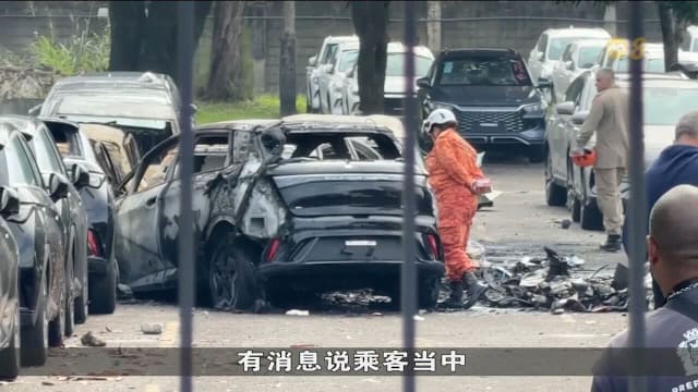 巴西直升机相撞 坠机引发火灾20余车烧毁