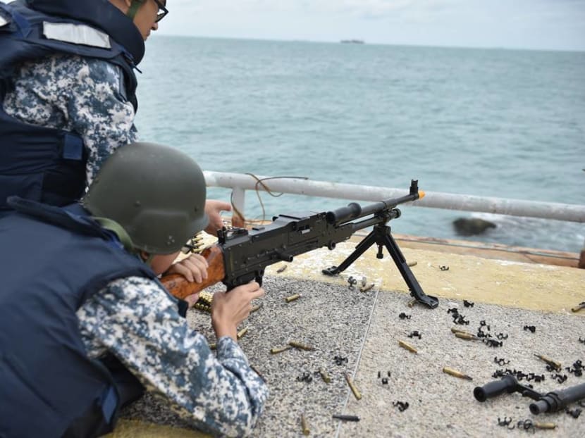 As part of the exercise, RSN and SPF personnel successfully intercepted and took down a simulated armed civilian intruder  -  a “testament to the operational readiness of our security forces”, the RSN said in a Facebook post on Friday (Sep 29). Photo: Facebook screencap via Mindef