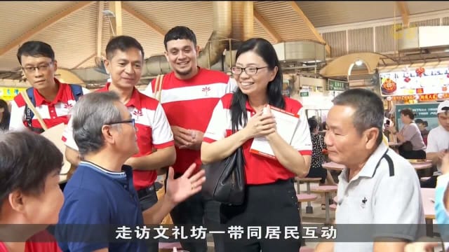 前进党潘群勤率队走访文礼坊 与居民互动派发传单