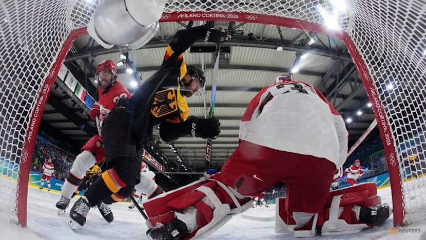 Ice hockey-Canada blank Czechs, US overpower Latvia, wins for Swiss and Germany