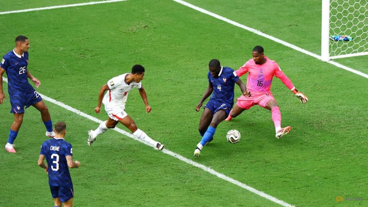 Soccer Football - FIFA World Cup 2026 - Bronze Final - France v England - Miami Stadium, Miami Gardens, Florida, U.S. - July 18, 2026 England's Jude Bellingham scores their sixth goal REUTERS/Marco Bello (Ảnh: CNA)