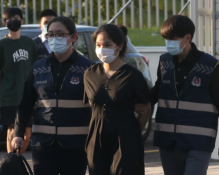 Luxury goods scam: Fugitive couple arrested in Johor Bahru, brought back to Singapore