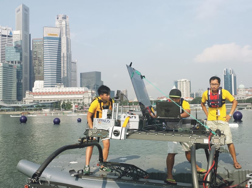 The NUS team working on their craft during a practice session. Photo: Khairul Amri