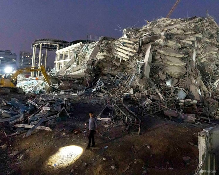 Thai construction magnate surrenders on felony negligence charges over building collapse in quake