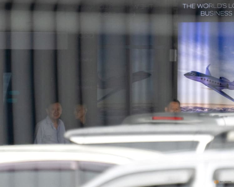 Thai ex-PM Thaksin lands in Bangkok ahead of crucial court date