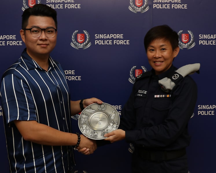 Man honoured for helping police nab upskirt video suspect at Marsiling MRT station