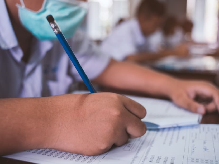 Quarantined students taking PSLE must inform schools 2 days before paper, take daily COVID-19 tests Quarantined students taking PSLE must inform schools 2 days before paper, take daily COVID-19 tests