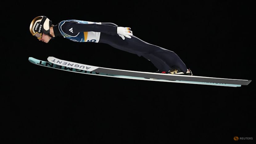 Ski Jumping-Germany's Raimund soars to gold, Slovenia's Prevc falls short