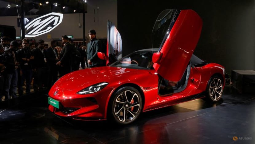Carmakers at India auto show unveil charging network plans, new EVs Carmakers at India auto show unveil charging network plans, new EVs