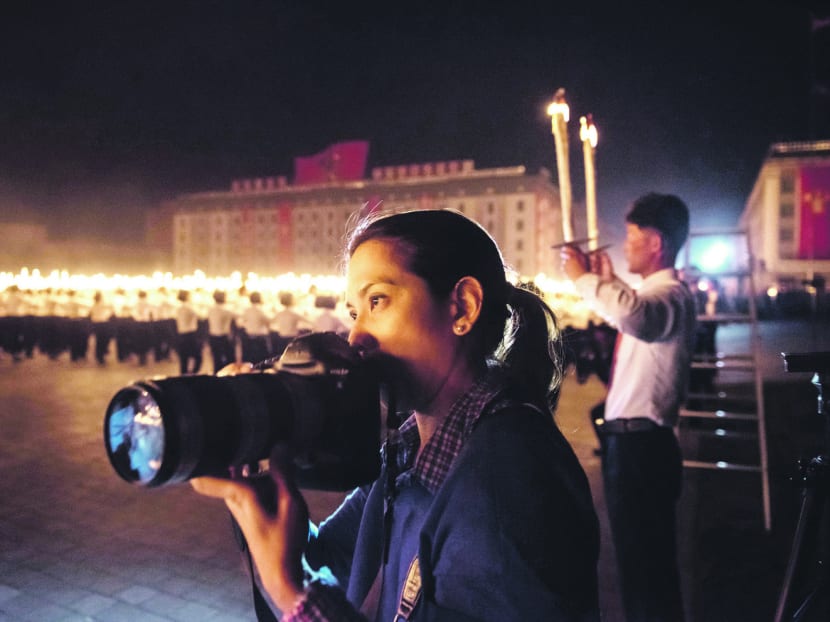 These women are the triple hot-shots in S'pore's photography scene