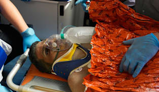 Venezuelan security guard pulled alive from building basement 8 days after twin quakes