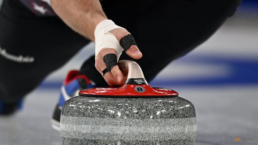 Curling-Compartmentalising the key for curlers pulling double duty at Games