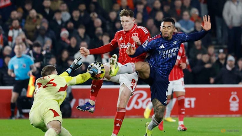 Arsenal frustrated by feisty Forest but move seven points clear at top