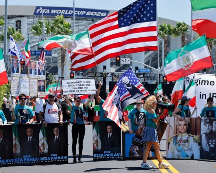 Iranian American protesters gather as soccer team prepare for World Cup opener