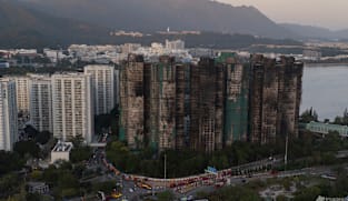 Hong Kong police arrest man for posts about deadly fire