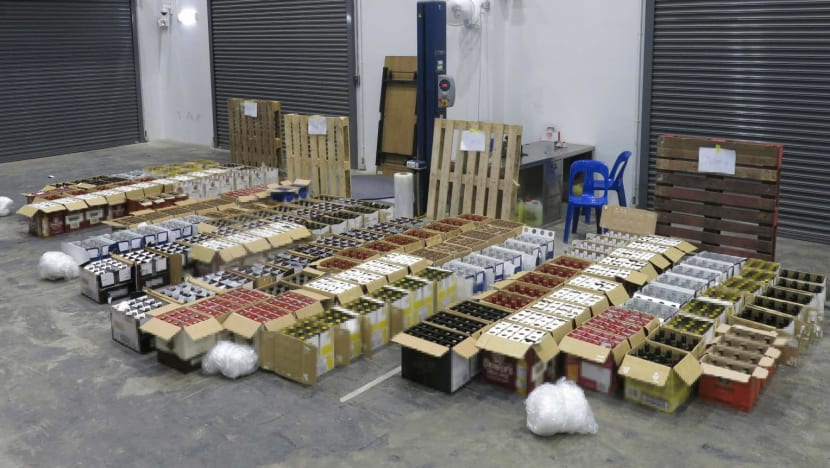 Man fined over S$700,000 for role in scheme to evade duty, GST by illegally diverting liquor for local sale Man fined over S$700,000 for role in scheme to evade duty, GST by illegally diverting liquor for local sale