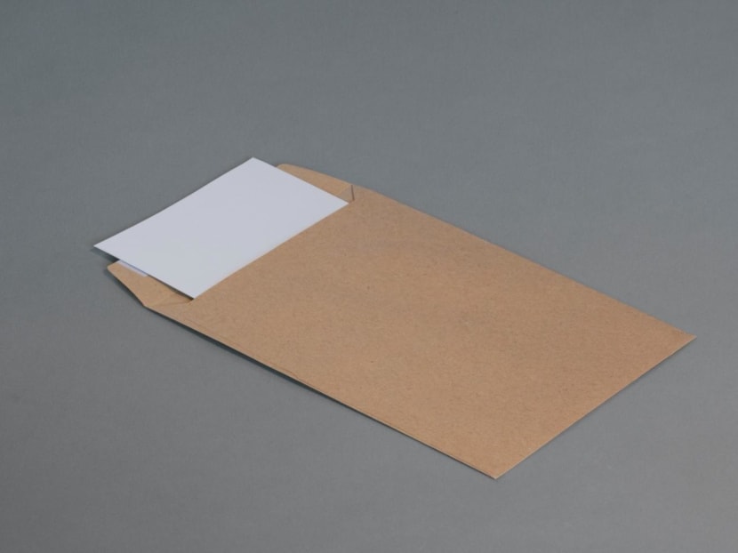 Lee Lit Meing sent letters to various parties using envelopes from the National University of Singapore that he found at the void deck near the public housing block where he lived. Lee Lit Meing sent letters to various parties using envelopes from the National University of Singapore that he found at the void deck near the public housing block where he lived.