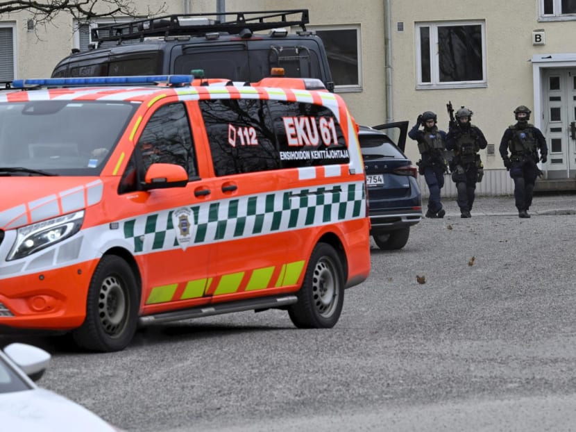 Police officers operate at the Viertola comprehensive school in Vantaa, Finland, on April 2, 2024. 