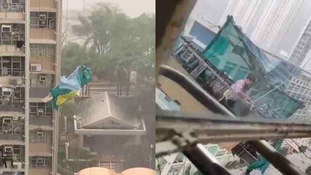 香港遇狂风吹袭 工人被困吊篮空中惊险飘荡