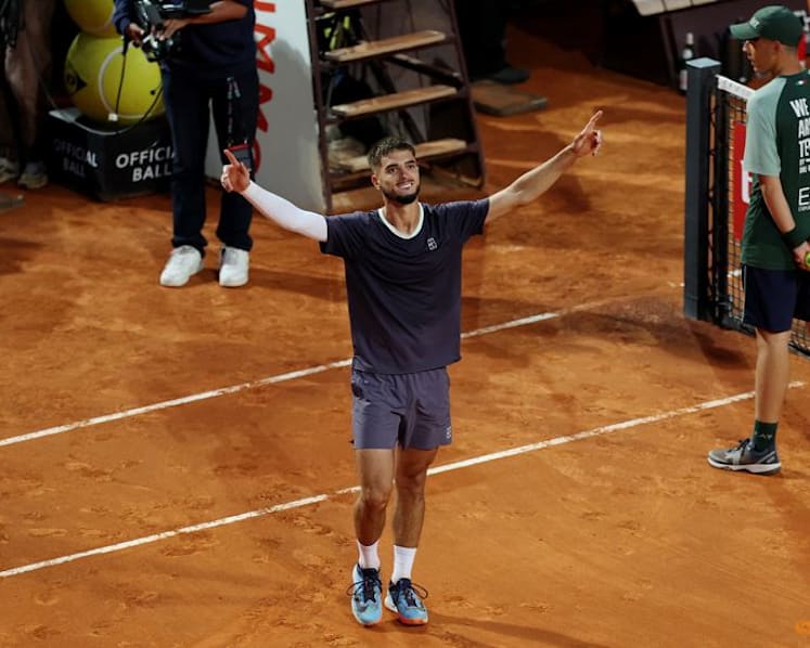 Prizmic stuns idol Djokovic at the Italian Open