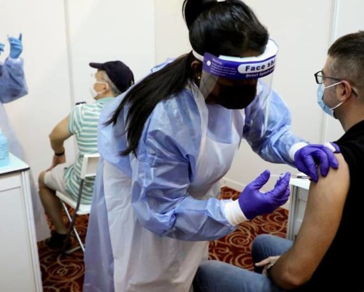 Malaysia eases COVID-19 curbs to allow home quarantine for fully vaccinated Malaysians, PRs