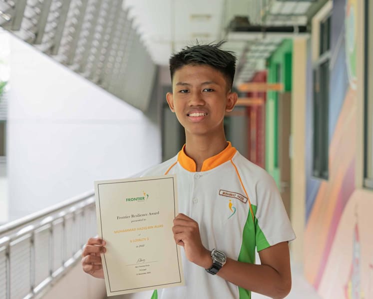 Unable to see his ailing mother for months before she died, student worked hard for PSLE to 'make her proud'