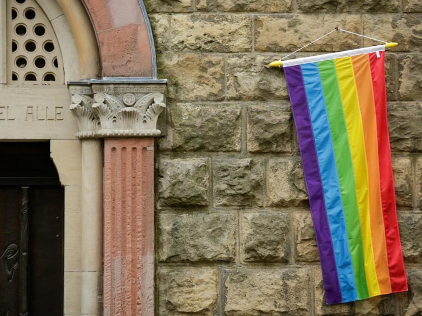 A rainbow flag is seen on the wall of a Catholic church as the building is open for same-sex couples to receive a blessing in Cologne, Germany on May 10, 2021.
A rainbow flag is seen on the wall of a Catholic church as the building is open for same-sex couples to receive a blessing in Cologne, Germany on May 10, 2021.
