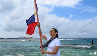 Philippine senator calls out China in visit to disputed island