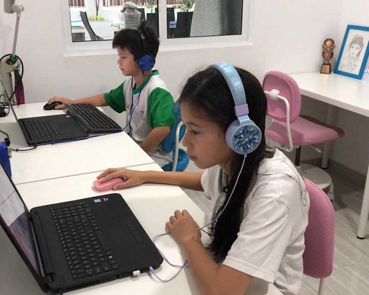 Parents hunt for laptops, deal with distracted kids on first day of ongoing home-based learning