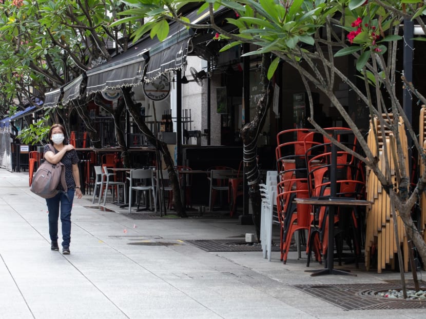 Chairs stacked outside shuttered eateries in China Square Central on May 20, 2020.