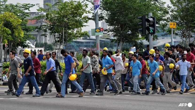 Why do migrant workers pay thousands of dollars to work in Singapore? Why do migrant workers pay thousands of dollars to work in Singapore?
