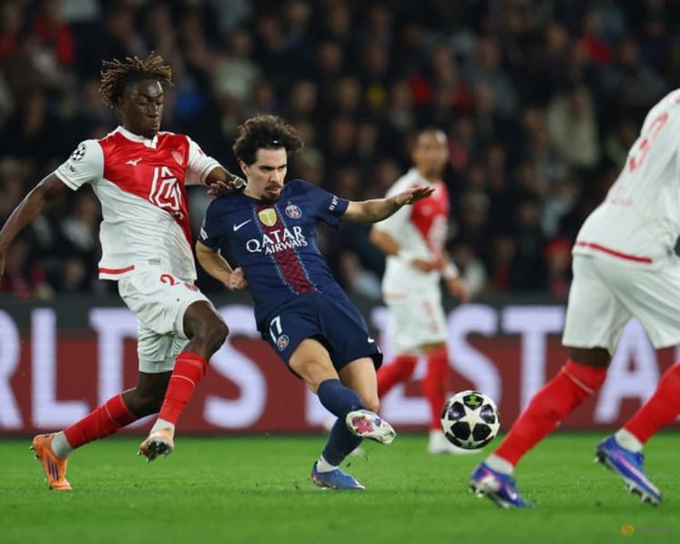 PSG see off late Monaco surge to advance in Champions League