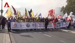 Hundreds detained in nationwide protests over French budget cuts 