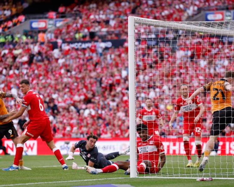 Hull back in Premier League after McBurnie's last-gasp playoff winner