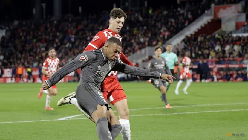 Real Madrid close on leaders Barcelona with 3-0 win at Girona