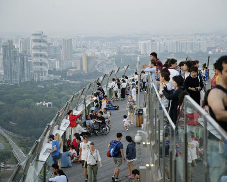 ‘Cough, my photos are grey’: Not-so-perfect views and air for tourists here for F1 race