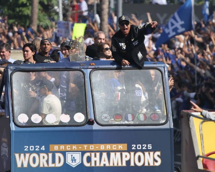 Baseball-Ohtani teases 'three-peat' as Dodgers parade draws Los Angeles crowds