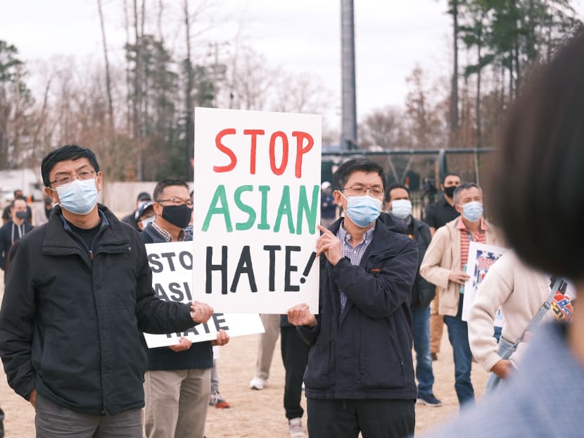People gather in support of the Asian American community at the Stop The Hate rally at Short Pump Park in Henrico County, Virginia, US on March 23, 2021.