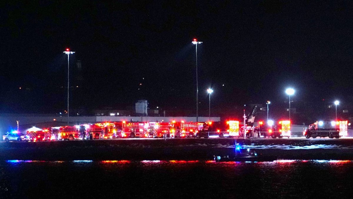 American Airlines jet crashes after collision with helicopter near Washington’s Reagan Airport