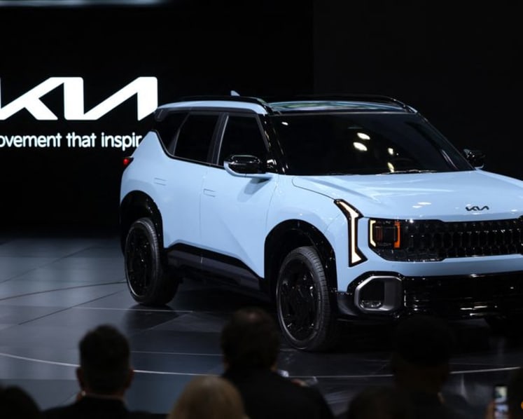 Automakers unveil new EVs for US market despite sales downturn
