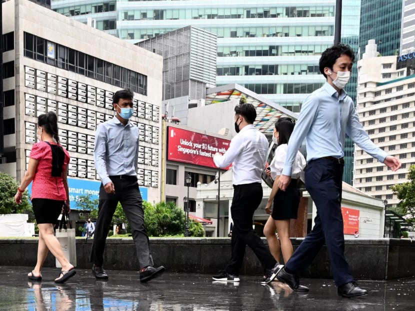 Office workers out and about in the financial district of Singapore.