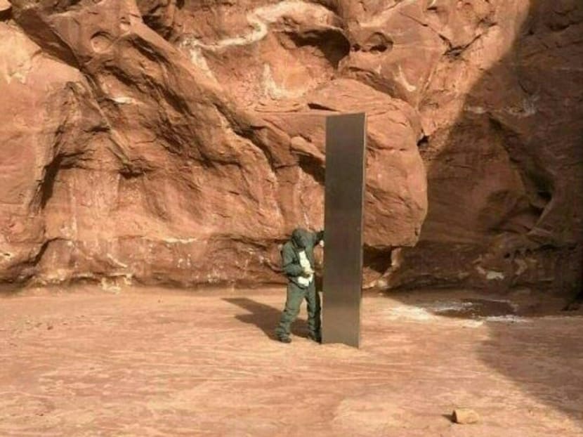 This video grab image obtained on Nov 24, 2020 shows a mysterious metal monolith that was discovered in Utah after public safety officers spotted the object while conducting a routine wildlife mission.