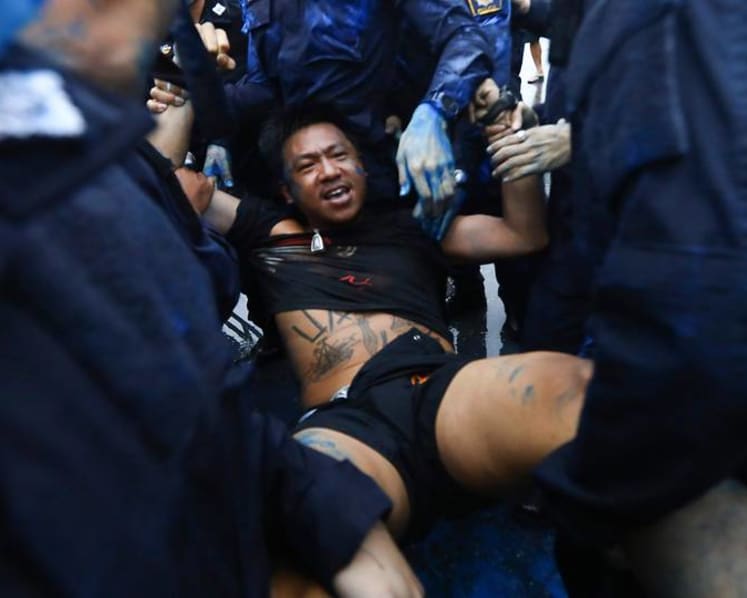 Thai police arrest protesters camping out ahead of rally in Bangkok